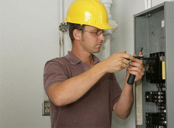 Licensed electrician performing a residential electrical panel upgrade in Winfield, WV